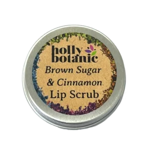Brown sugar and cinnamon lip scrub. Natural, handmade lip screw suitable for vegans. Presented in an aluminium, recyclable, screw top tin. Front