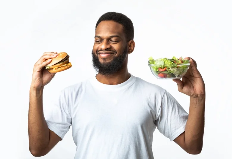We know that what we eat has a profound and direct effect on our health, our hormones, and particularly on our resistance to disease. It’s reassuring that medical research has found that choosing to eat a healthy diet can give protection from prostate issues such as inflammation, urinary problems, benign prostatic hyperplasia (BPH), and prostate cancer. In this blog we’ll highlight the foods that can put you most at risk as well as looking at the kind of diet that will give protection. Understanding the Prostate Just below the bladder, encircling the urethra which carries urine and semen out of the body, is a gland the size of a walnut. This gland is called the prostate, and it plays a crucial role in a man’s reproductive and urinary functions. Understanding how this vital gland works, and the issues that can arise with its functionality is key to helping it stay healthy and working well. The prostate makes the liquid which carries semen and keeps sperm healthy. This is why the prostate gland is so important to a man’s fertility. Due to its position close to the bladder and urethra, any inflammation of the prostate can cause problems and discomfort with urination. When things go wrong with the health of the prostate, symptoms causing pain and disruption to urination are often the result of inflammation known as prostatitis. This inflammation causes the prostate gland to swell, resulting in pain and problems with urinating. It may also sometimes cause a raised temperature or fever. Prostatitis is a very common condition particularly in later years, and it frequently results in a condition called benign prostatic hyperplasia (BPH). Symptoms include a frequent need to pee, a weak flow, and difficulty with completely emptying the bladder. Prostate cancer is one of the most common cancers for men and it may have similar symptoms to BPH. This is why it is very important not to ignore the symptoms but to get your GP to arrange tests as soon as possible. Early detection and treatment are the key to a good outcome. How Diet Affects the Health of the Prostate Scientific research, in addition to finding cures for disease, now focusses much more on looking at health problems in a holistic way. Findings of many studies have verified that what you eat has a biochemical effect on the way your body works, and this applies very much to the healthy functioning of the prostate. Understanding how certain nutrients and carcinogens affect prostate health will enable you to make good decisions on which foods to eat and which to avoid. A clinical review published in 2021 examines currently researched knowledge of the role of nutrients and dietary factors relating to prostate health. The review makes the point that an awareness of the beneficial and harmful effects of food is of great importance in the fight against prostate cancer. Our immune system’s natural response to injury and infection is to produce inflammation to protect and heal the injury. It is when the inflammation becomes chronic that it can lead to certain diseases, and the prostate is one of those areas where prolonged inflammation can cause problems. Antioxidants are molecules which neutralise free radicals from your body, and free radicals are compounds which are the by-products of metabolism. Due to the toxicity of free radicals, if they are not controlled, they can cause cell damage which could pose a risk of cancerous changes. Your body’s own defence system will normally take care of controlling free radicals, but sometimes, due to various factors, including poor diet or other lifestyle issues and habits, your system may need some help. This is where plenty of antioxidant-rich foods in your diet will help. A diet that includes foods that provide anti-inflammatory and antioxidant benefits, such as berries, oily fish for omega 3, green vegetables - particularly cruciferous varieties such as broccoli and cauliflower, will reduce inflammation and help protect your prostate. Ten Worst Foods for Prostate Health