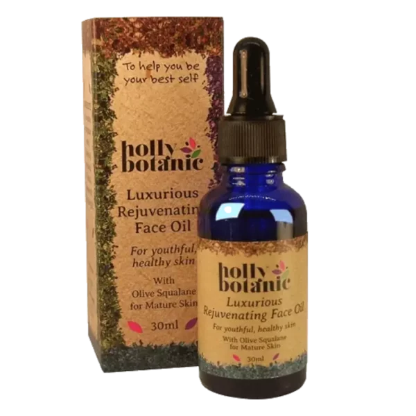 Holly Botanic rejuvenating face oil for mature skin box and bottle. Recyclable cardboard box. 30ml blue, recyclable glass bottle with pipette.