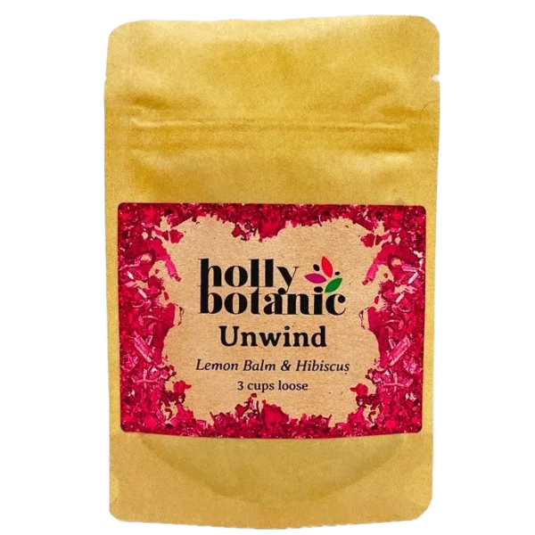 Unwind tisane by Holly Botanic, lemon balm and hibiscus to relax and calm, 3 cup loose. Recyclable packaging.