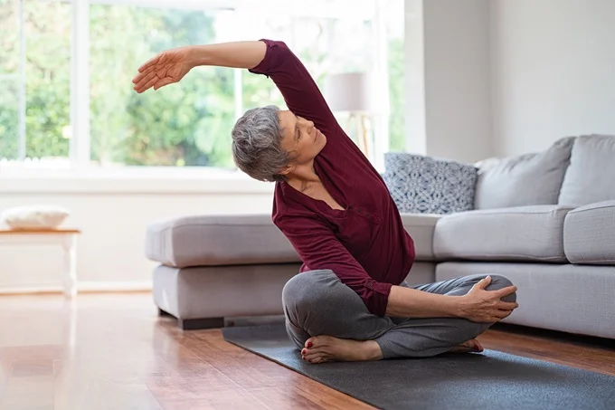 Yoga and stretching can lower stress and strengthen muscles, limbs and joints.