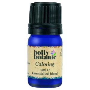 Calming essential oil blend by Holly Botanic. A 5 or 10ml recyclable, blue glass, recyclable dropper bottle.