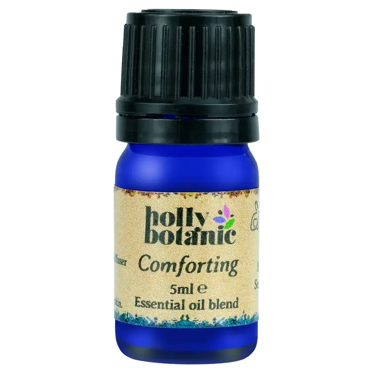 Comforting essential oil blend by Holly Botanic. A 5 or 10ml recyclable, blue glass, recyclable dropper bottle.