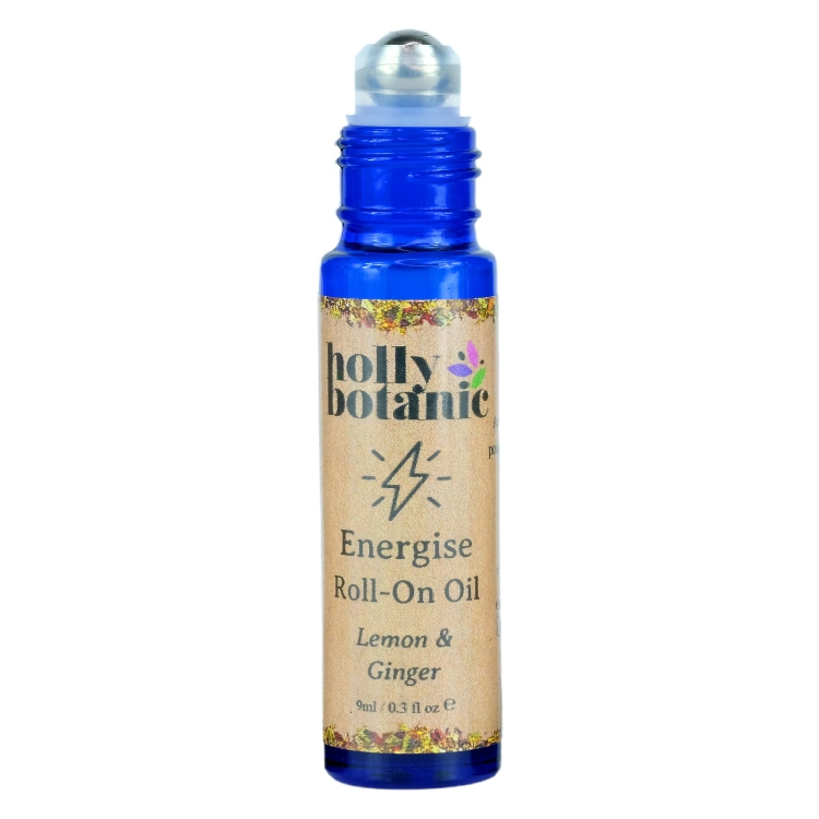 Energise roll on oil by Holly Botanic. 9ml, blue glass, recyclable bottle with metal roller and plastic lid. Lid off.