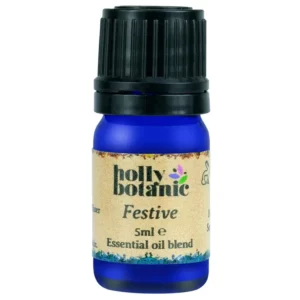 Festive essential oil blend by Holly Botanic. A 5 or 10ml recyclable, blue glass, recyclable dropper bottle.