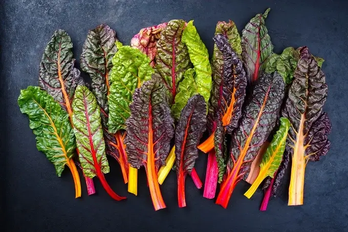 Top food sources of magnesium include pumpkin seeds, swiss chard and spinach.