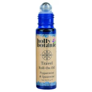Travel roll on oil by Holly Botanic. 9ml, blue glass, recyclable bottle with metal roller and plastic lid. Lid off.