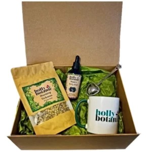 Mum to be gift set includes morning sickness tisane, mug, infuser and belly rub. Gift for a mum to be in a cardboard, magnetic-close reusable gift box.