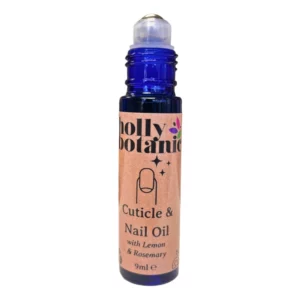 Cuticle oil and nail oil by Holly Botanic. Natural plant oils and essential oils in a handy glass, rollerball bottle. Image with Lid Off