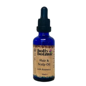 Rosemary Hair Oil by Holly botanic in a 100ml blue glass pipette bottle.