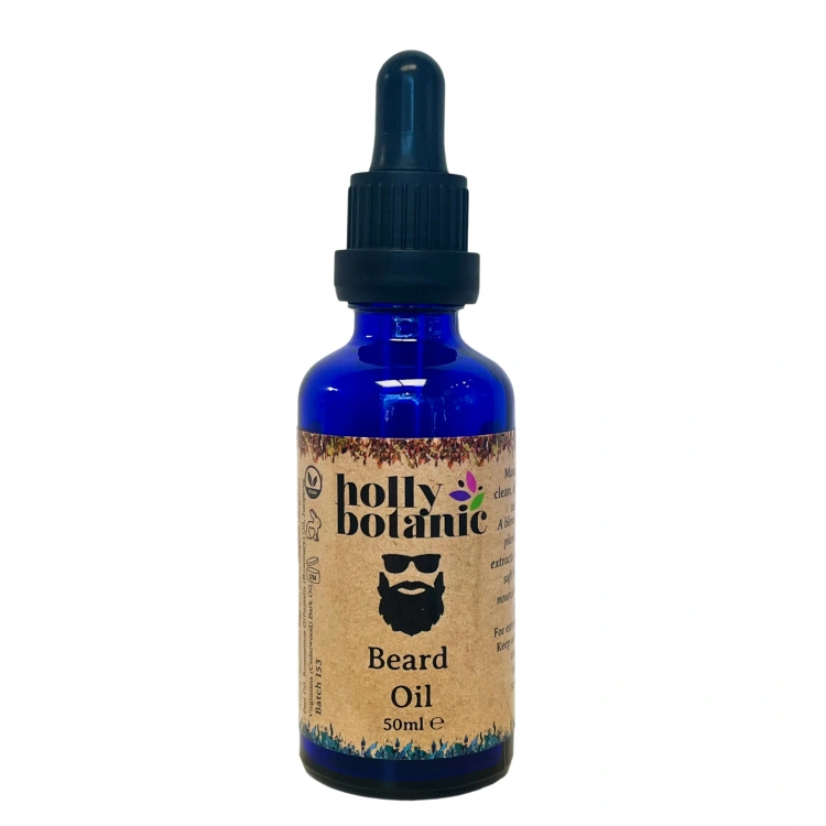 Beard oil supplied in a blue glass, recyclable 50ml bottle with pipette.